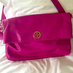 Tory Burch used purse very good condition color is magenta.